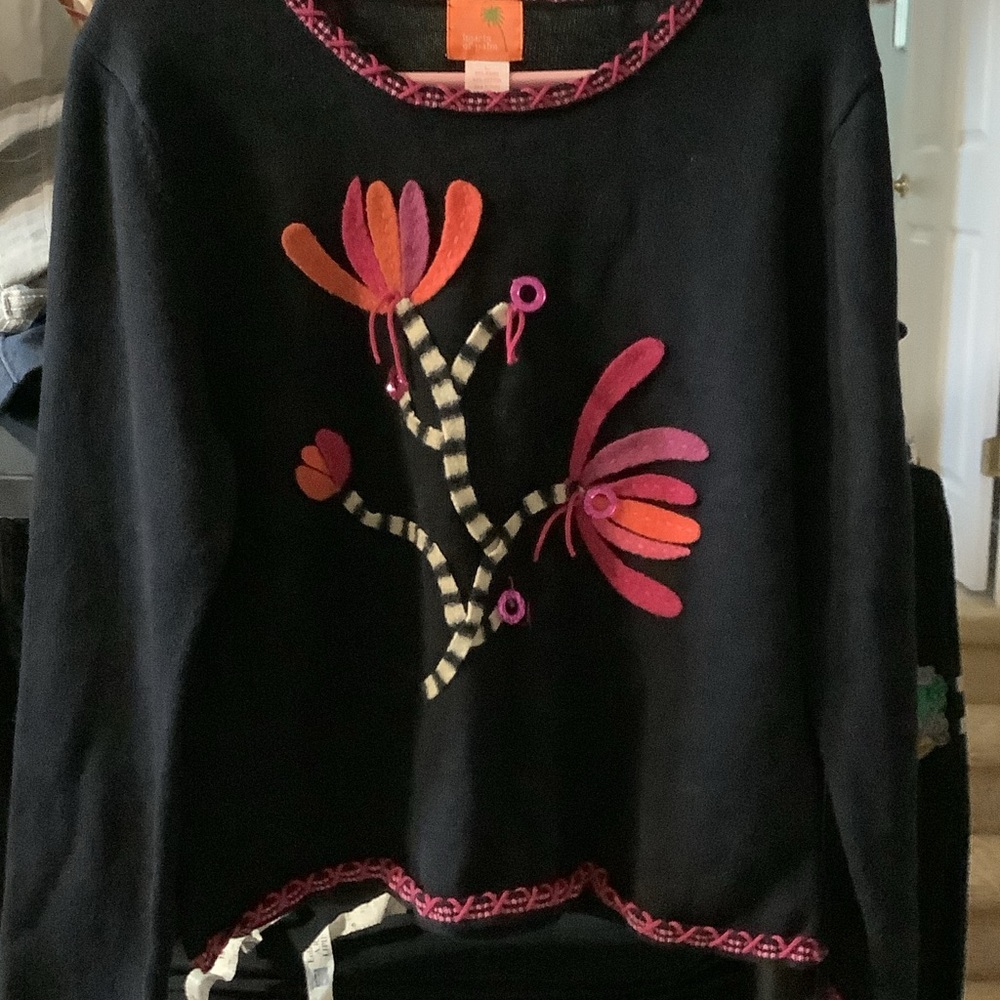 Hearts of Palm Black Sweater with Vibrant Floral Design